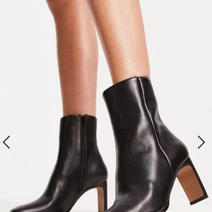 ASOS DESIGN Remmy set-back heeled boots in black